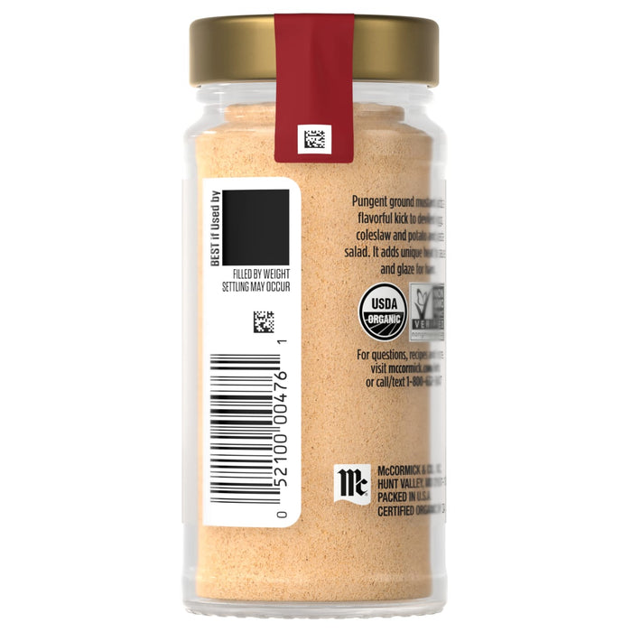 A jar of Simply Organic Garlic Powder with a gold lid and a red label.
