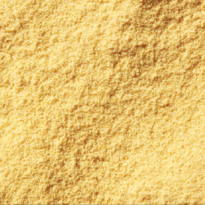 Close-up of a coarse, light-yellow powder.