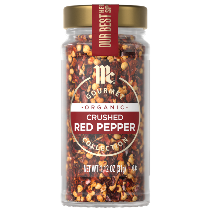 A jar of McCormick Organic Crushed Red Pepper is shown, highlighting its use as a flavorful spice.