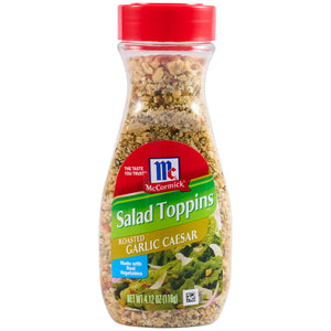 A bottle of McCormick Salad Toppins Roasted Garlic Caesar salad topping.