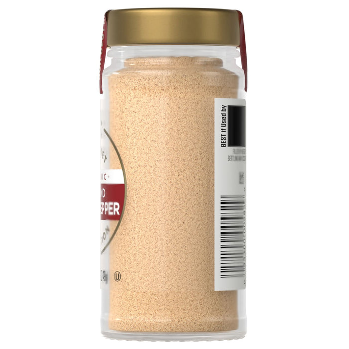 A McCormick Garlic Powder bottle is shown.