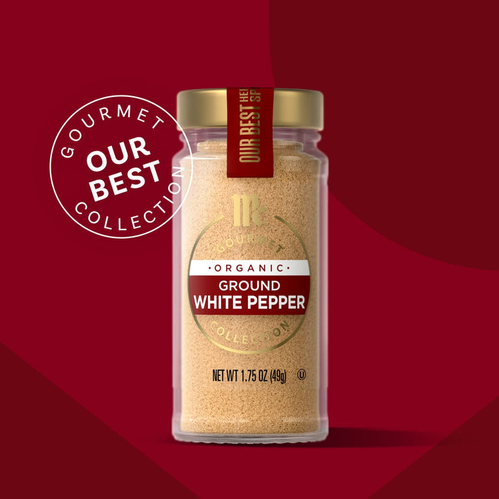 A jar of Gourmet Our Best Collection Ground White Pepper is displayed against a red background.
