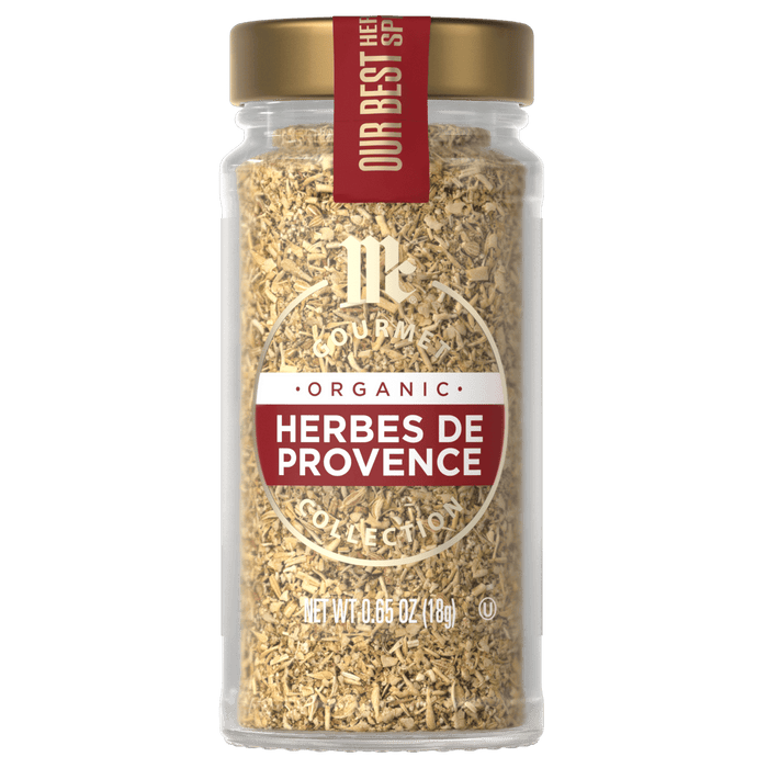 A jar of McCormick Organic Herbes de Provence seasoning.