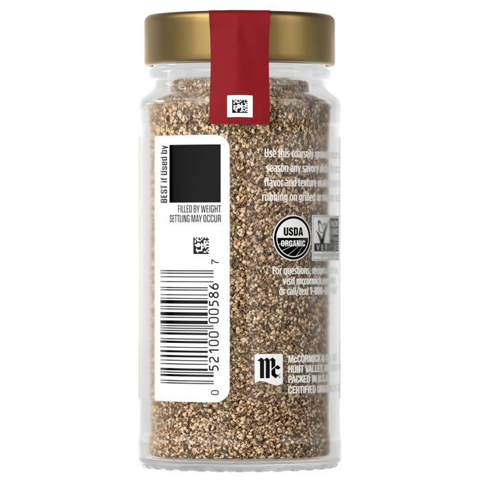 A jar of McCormick organic white pepper with a label showing a barcode and the USDA organic seal.