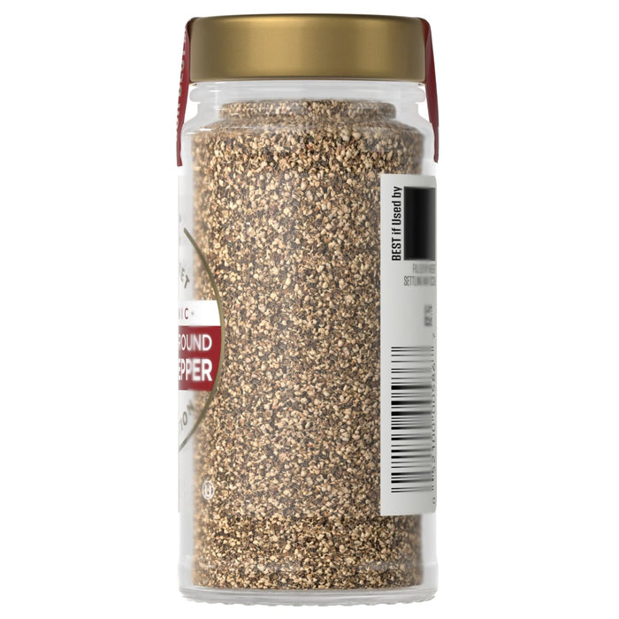 A bottle of McCormick Ground Black Pepper is shown, highlighting the product's appearance and packaging.