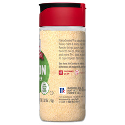 A container of McCormick Onion Powder.