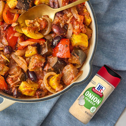A bowl of McCormick Onion Powder with a side of eggplant and zucchini stew.