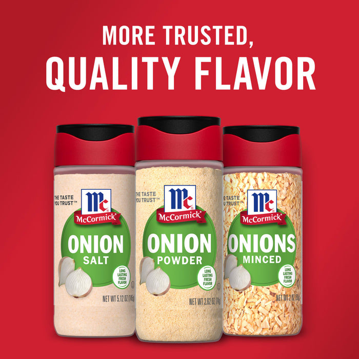 Three McCormick onion seasoning jars, one with salt, one with powder, and one with minced onions.