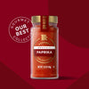 McCormick Gourmet Collection Paprika in a glass jar, showcasing the product's vibrant color and premium quality.