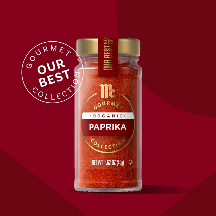 McCormick Gourmet Collection Paprika in a glass jar, showcasing the product's vibrant color and premium quality.