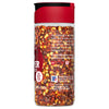 A McCormick Red Pepper spice jar with a red lid and a clear glass body filled with red pepper flakes.