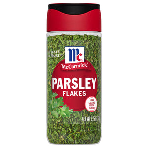 A bottle of McCormick Parsley Flakes.