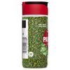 McCormick Parsley Flakes in a glass jar with a red lid.