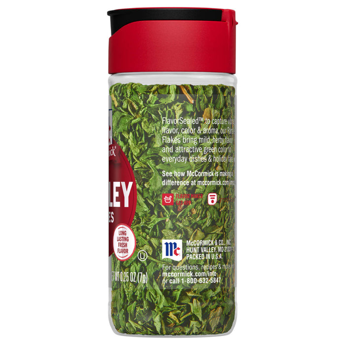 A bottle of McCormick Parsley Flakes.