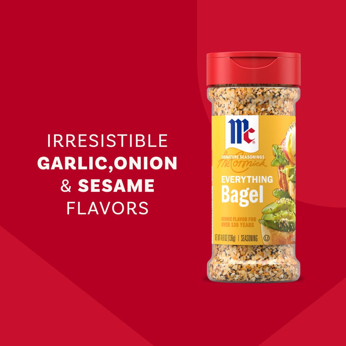 A bottle of Mccormick Everything Bagel Seasoning Assorted Form 4.8 Oz is displayed against a red background with text highlighting its irresistible garlic onion and sesame flavors.