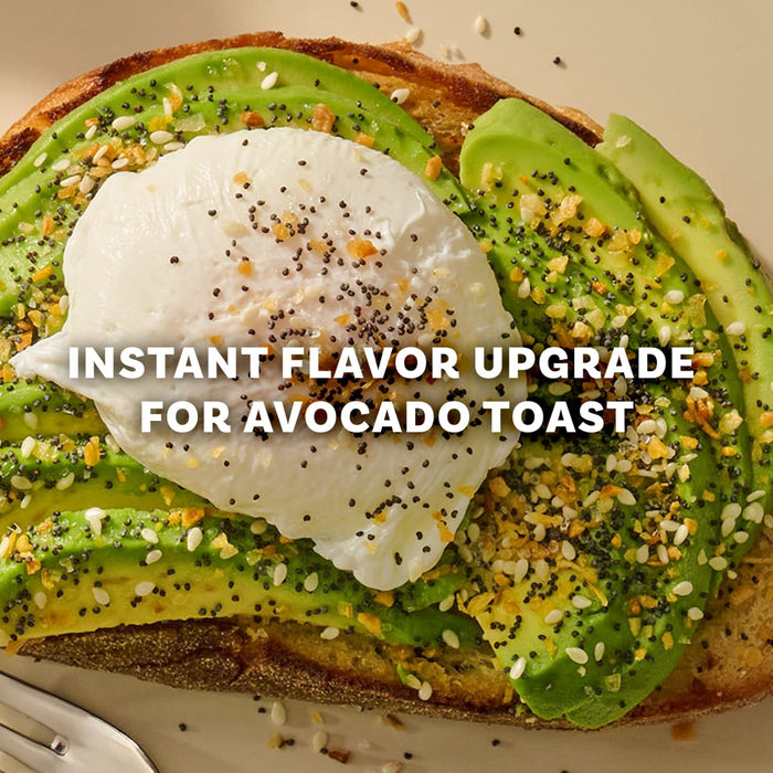 A close up view of a poached egg and sliced avocado on toast topped with Mccormick Everything Bagel Seasoning Assorted Form 4.8 Oz for an instant flavor upgrade.