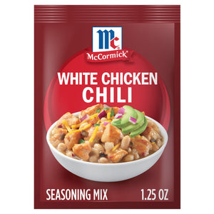 A packet of McCormick White Chicken Chili seasoning mix is displayed, featuring a bowl of the prepared chili.