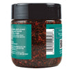 A McCormick Black Pepper and Garlic Seasoning jar with a teal label.