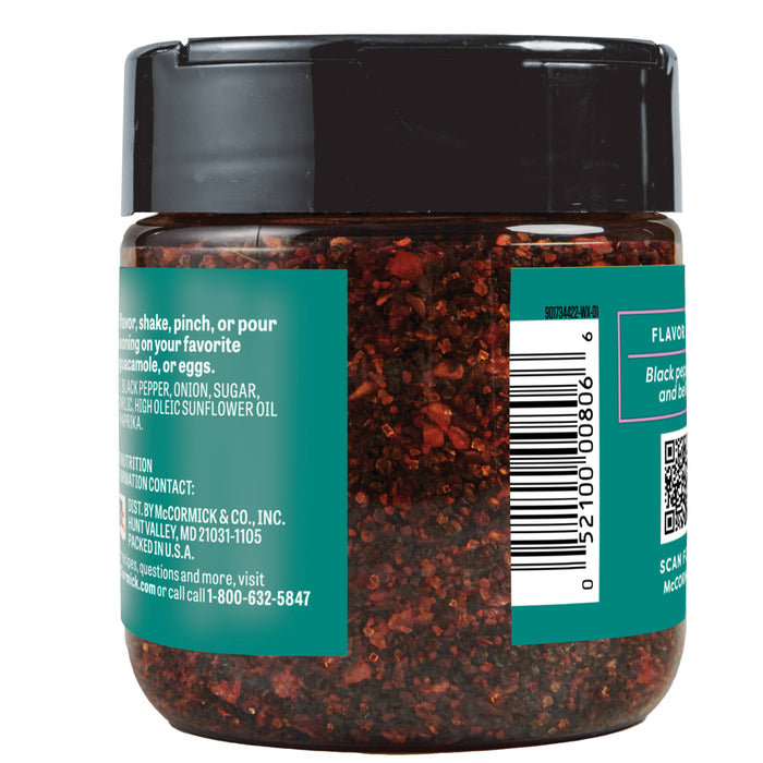 A McCormick Black Pepper and Garlic Seasoning jar with a teal label.