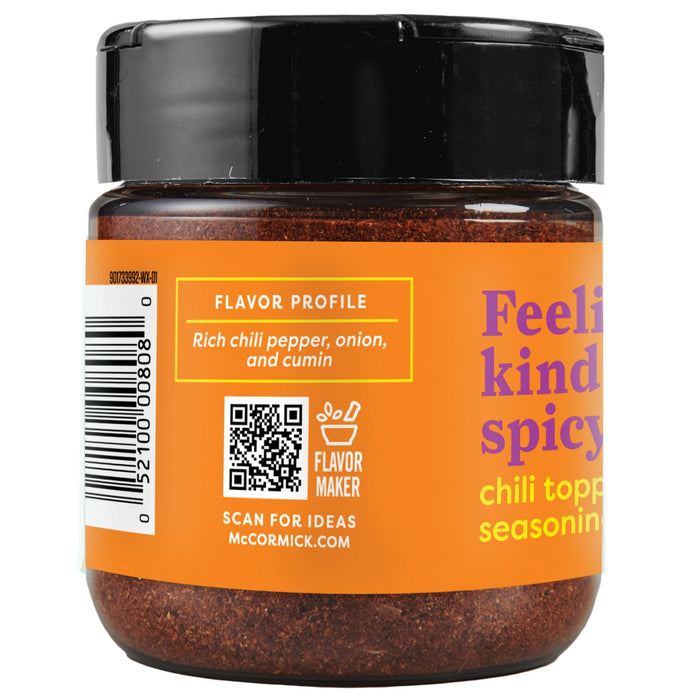 McCormick Feelin' Kind Spicy Chili Topping Seasoning jar with a barcode and a QR code.