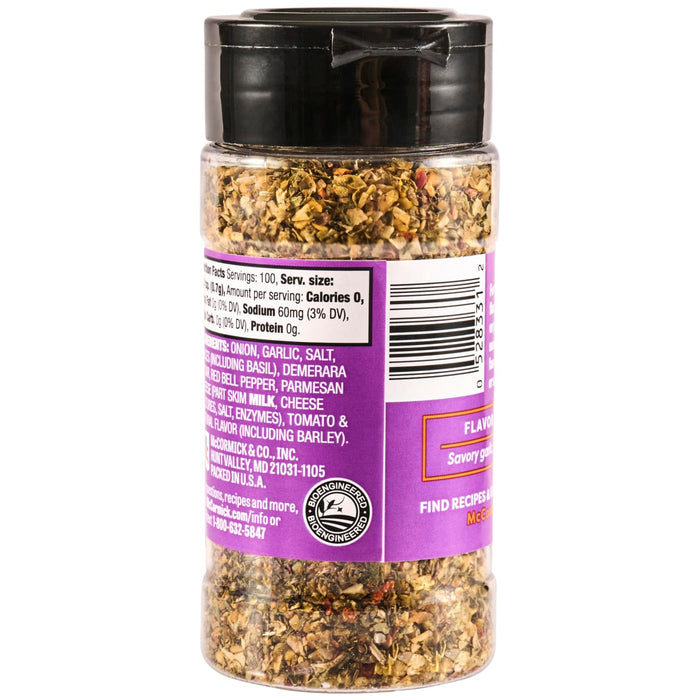 A container of McCormick Savory Garlic Flavor Enhancer with nutrition facts and ingredients listed on the label.
