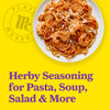 Flavor Makers image showcases a delicious plate of shrimp pasta promoting Herby Seasoning for Pasta Soup &amp; Salad.
