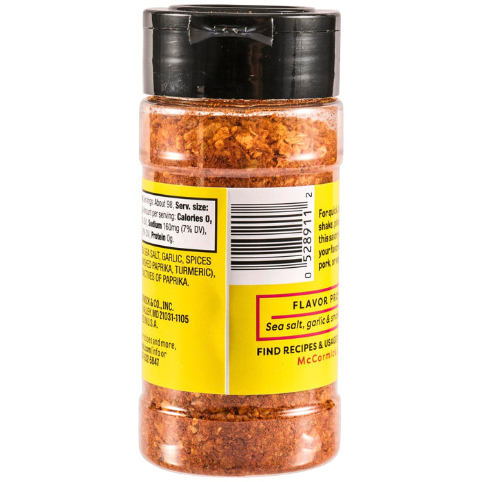 A container of McCormick Flavor Pro sea salt, garlic, and smoked paprika seasoning.