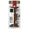 The back of a clear glass jar of Mccormick Gourmet, 0.42 Oz star anise, showing the product information, barcode, and Non-GMO Project Verified seal.