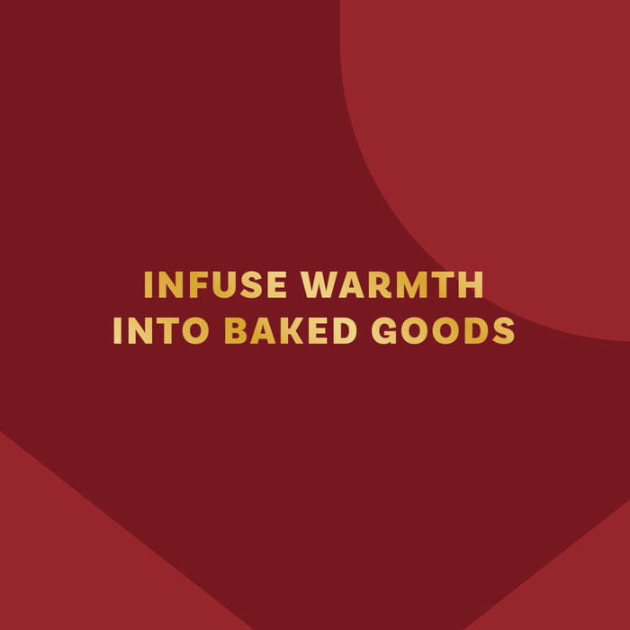 A warm red graphic illustration with the words INFUSE WARMTH INTO BAKED GOODS in gold lettering suggests the cozy flavor that a package of Mccormick Gourmet, 0.42 Oz can add to recipes.