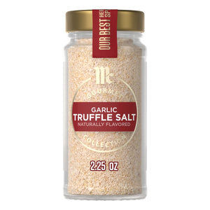 A clear glass jar of Mccormick Gourmet Garlic Truffle Salt, 2.25 Oz, is shown against a white background.