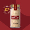 A glass jar of Mccormick Gourmet Garlic Truffle Salt, 2.25 Oz, is centered against a stylized red background.