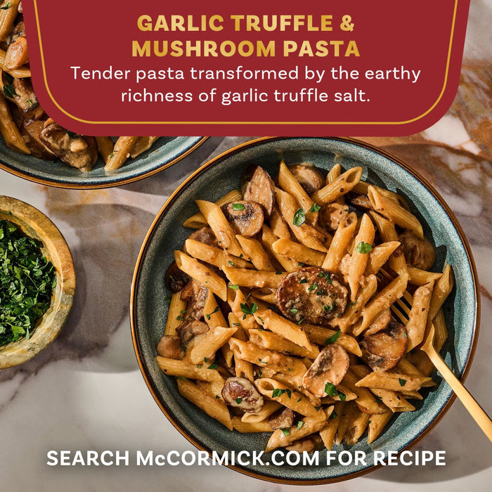 A finished dish of garlic truffle and mushroom pasta is shown as a serving suggestion for a recipe made with Mccormick Gourmet Garlic Truffle Salt, 2.25 Oz.