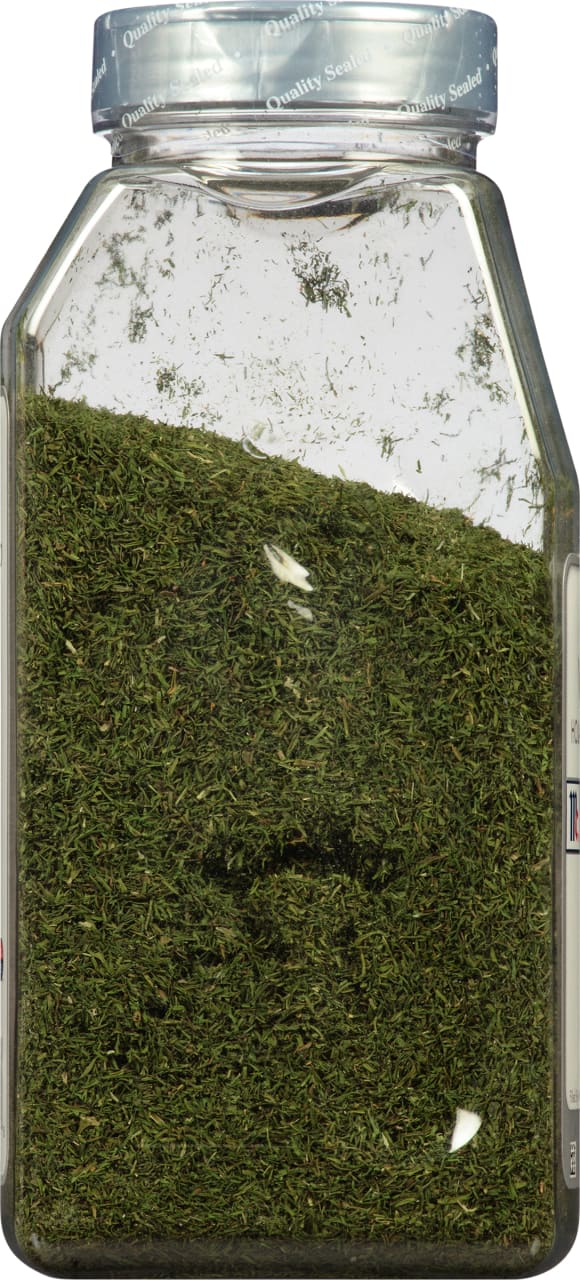 A glass jar of dried dill.