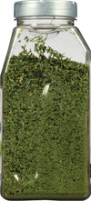 A clear plastic jar filled with dried parsley.
