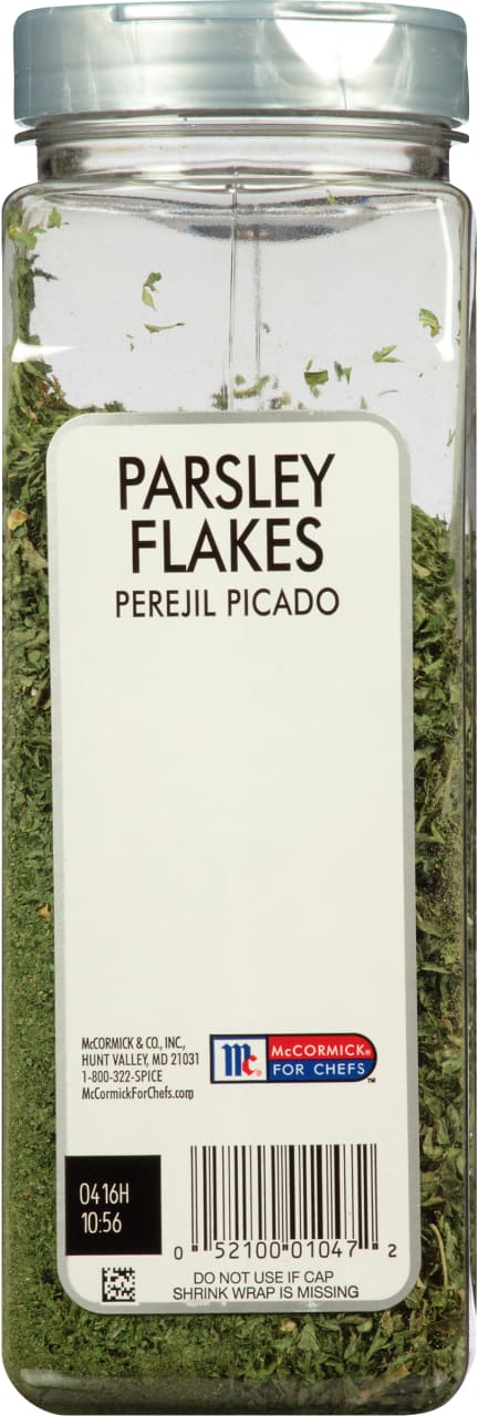 A McCormick For Chefs jar of parsley flakes.