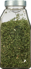 A clear plastic jar filled with dried parsley.