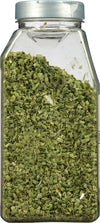 A clear plastic jar filled with dried chives.
