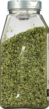 A clear plastic jar filled with dried chives.
