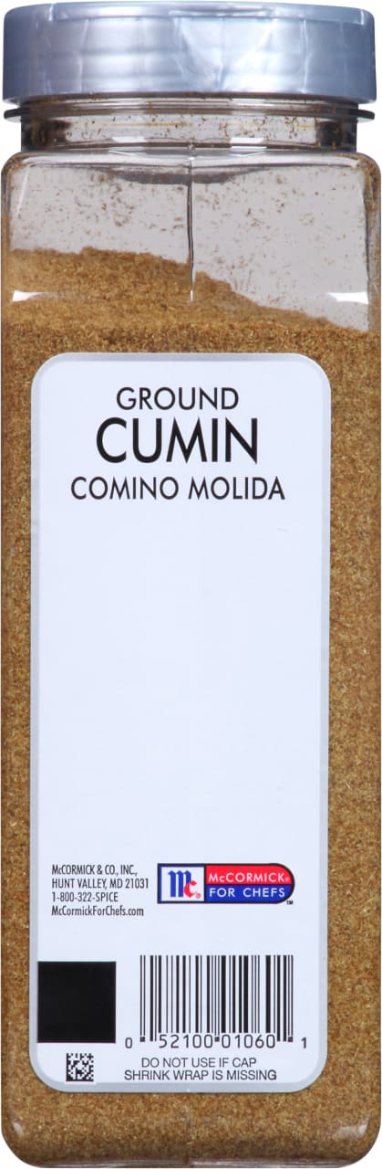 A McCormick for Chefs ground cumin spice jar with a white label.
