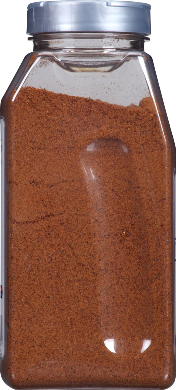 A plastic jar of McCormick Grill Mates Montreal Steak Seasoning.