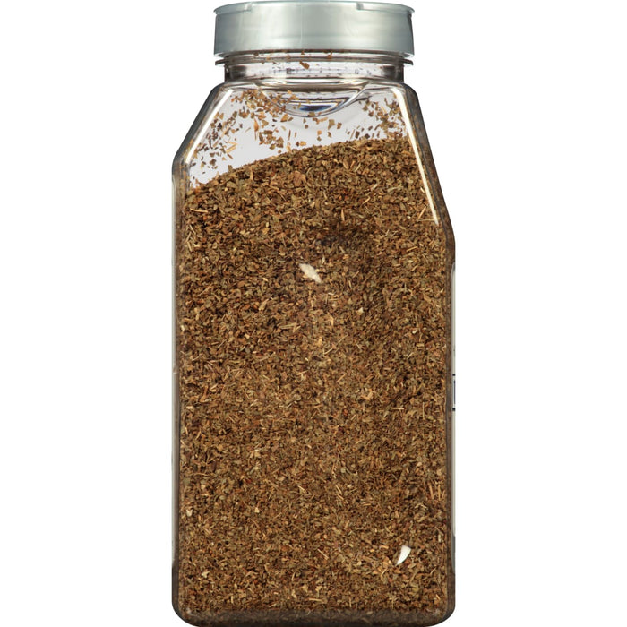 A clear plastic jar filled with dried oregano.
