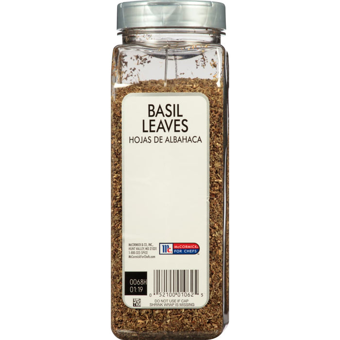 A glass jar of McCormick For Chefs Basil Leaves.