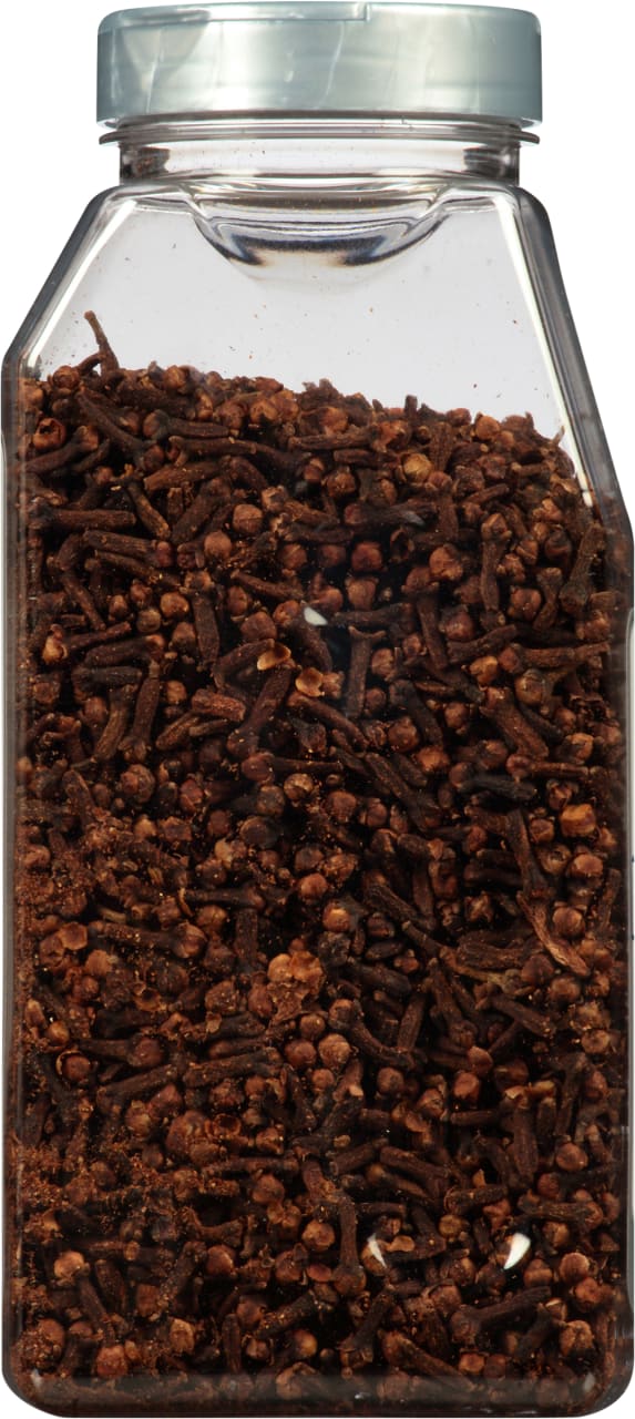 A glass jar filled with whole cloves.