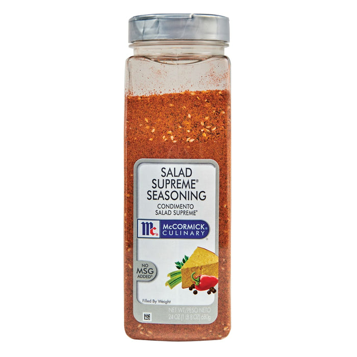 A McCormick Culinary Salad Supreme Seasoning bottle with a red and orange spice blend.