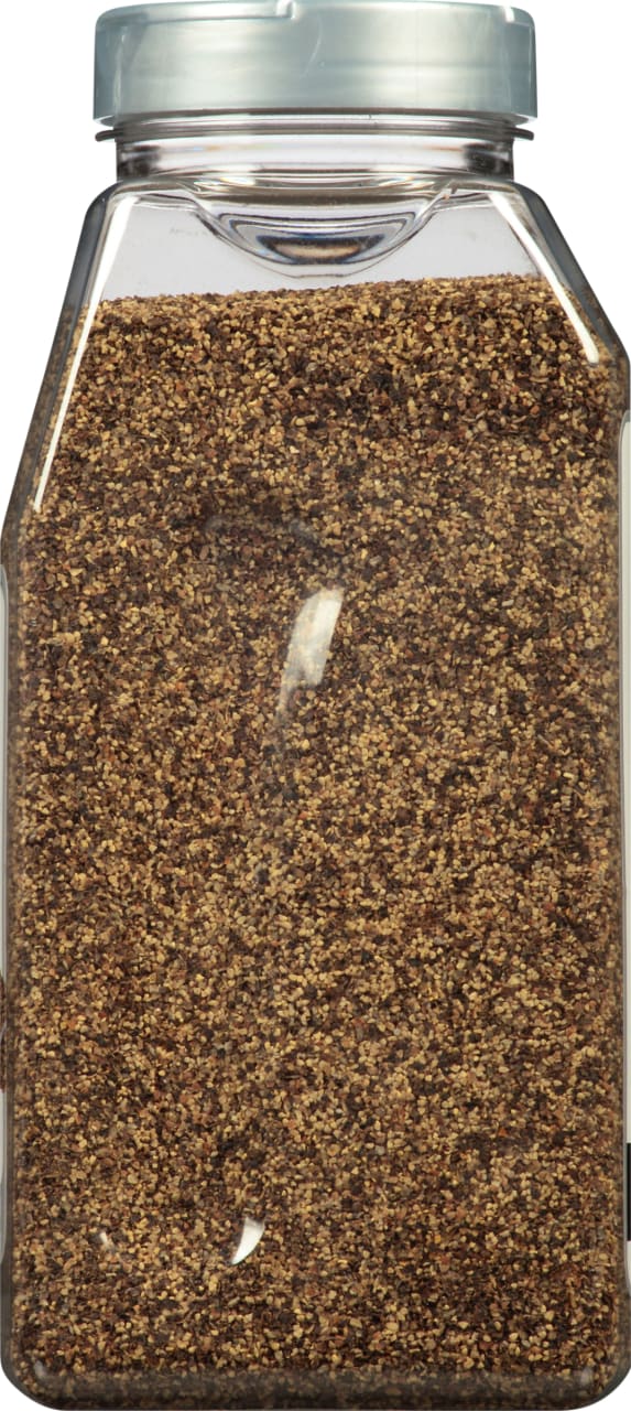 A clear plastic container filled with black peppercorns.