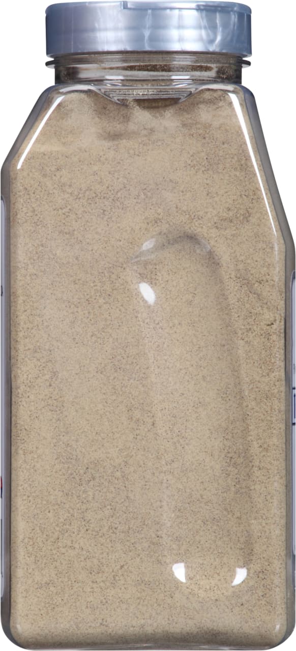 A plastic jar of ground pepper.
