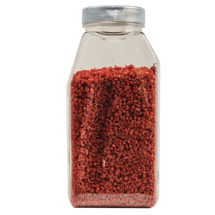 A clear plastic jar filled with freeze-dried strawberries.