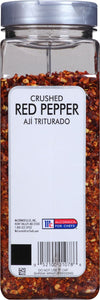 A McCormick For Chefs jar of crushed red pepper.