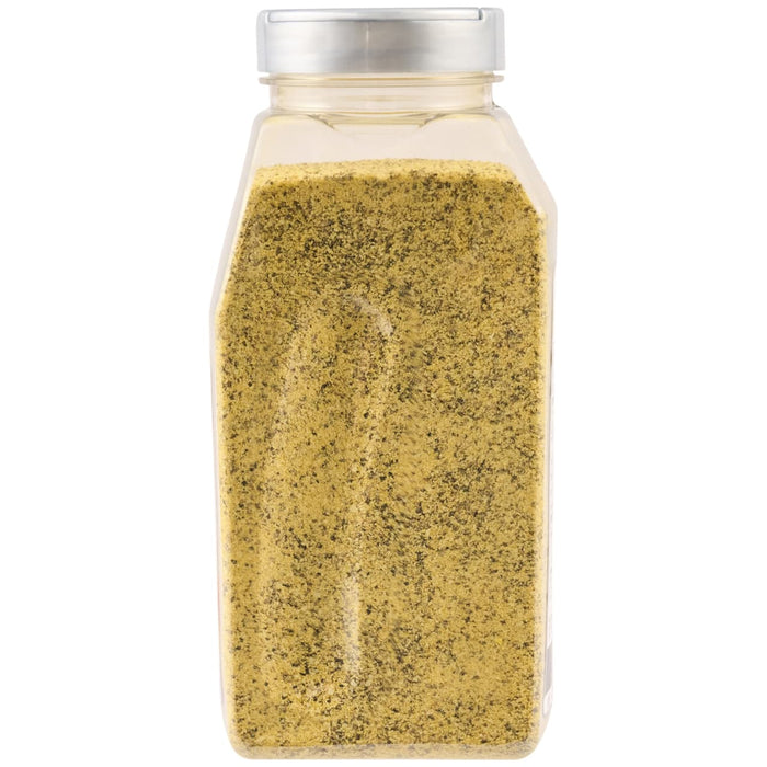 A clear plastic bottle with a silver lid filled with yellow and black seasoning.