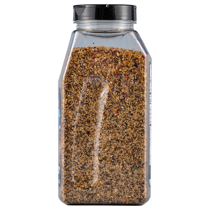 A clear plastic bottle filled with a blend of spices.